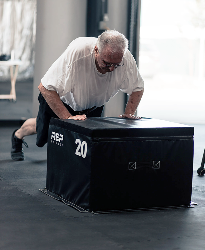 Cancer survivors doing strength exercises to rebuild after a cancer diagnosis