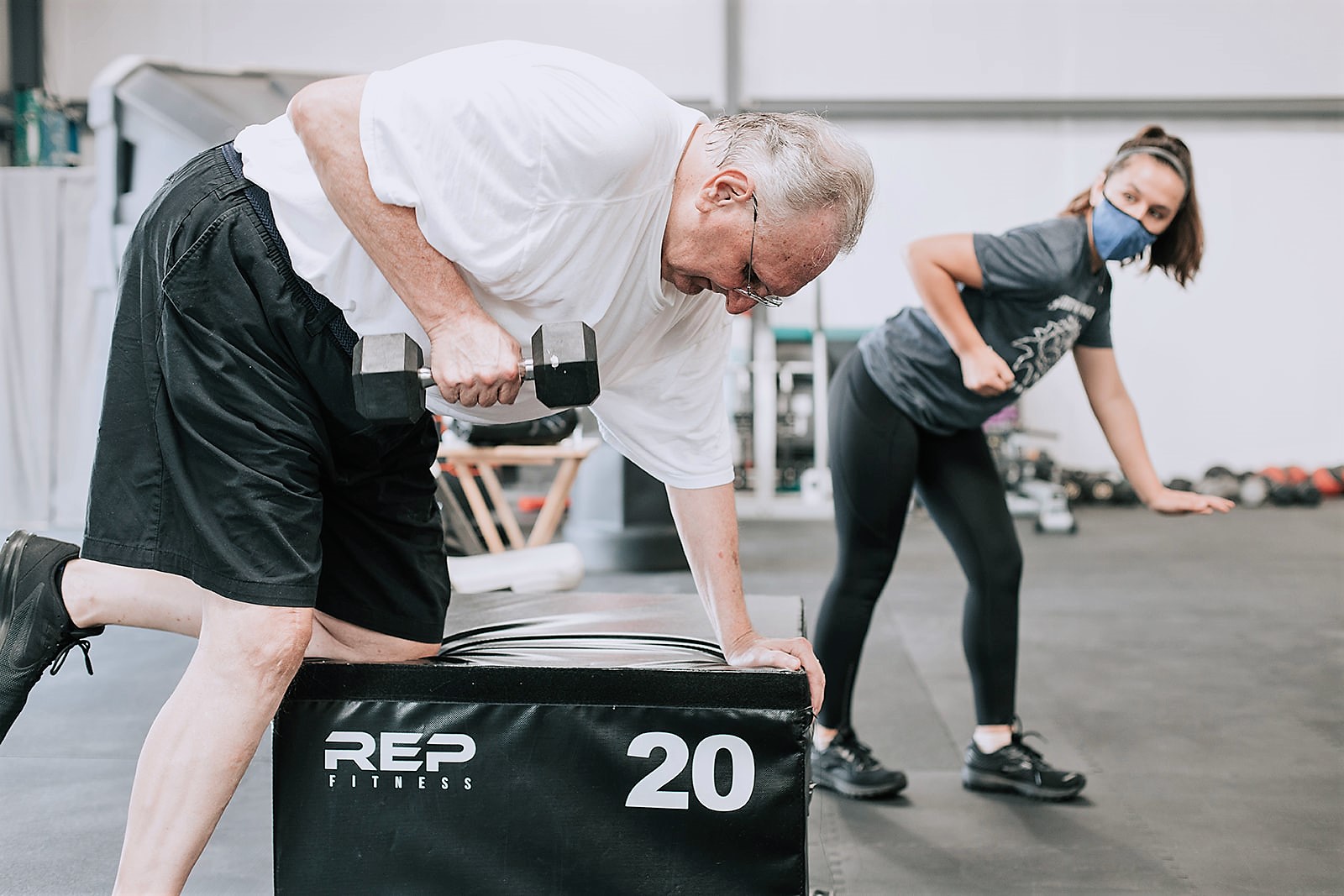 Personal Trainer working with a client