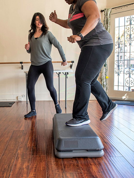 Cancer survivor doing light exercises