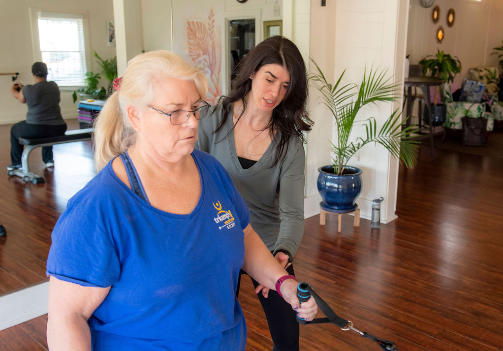 Cancer survivors doing warm-up exercises