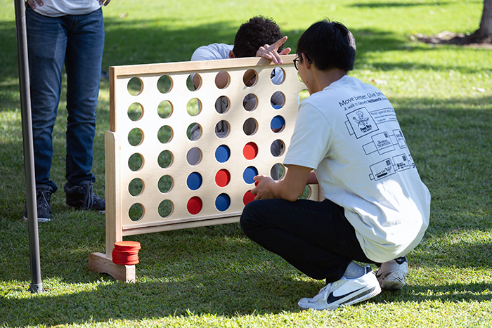People playing carnival games at a Parkinson's benefit walk in Fresno